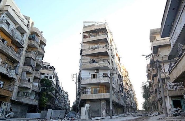 v-siriyskom-aleppo-obrushilsya-zhiloy-dom-11-pogibshikh